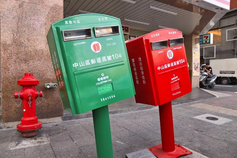 Mailboxes bent during typhoon in Taipei, Taiwan. The twisted mailboxes are a popular local landmark.