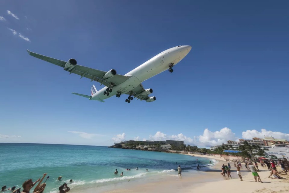 Maho Beach, Sint Maarten - 20th of October 2016: Low Flying Plane