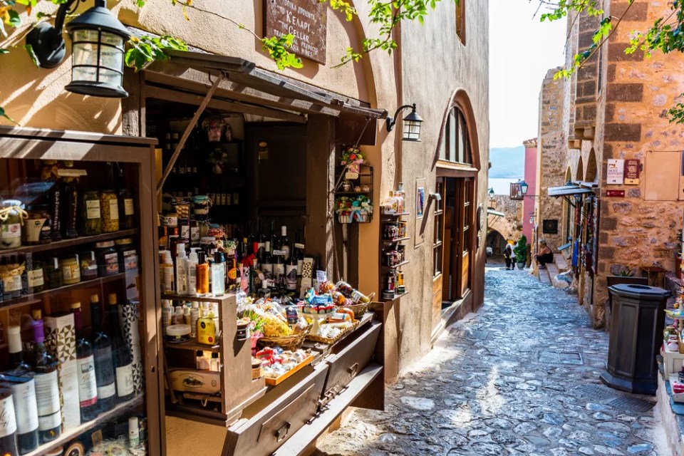 A view of a small shop selling wine and souvenirs in Monemvasia, Greece