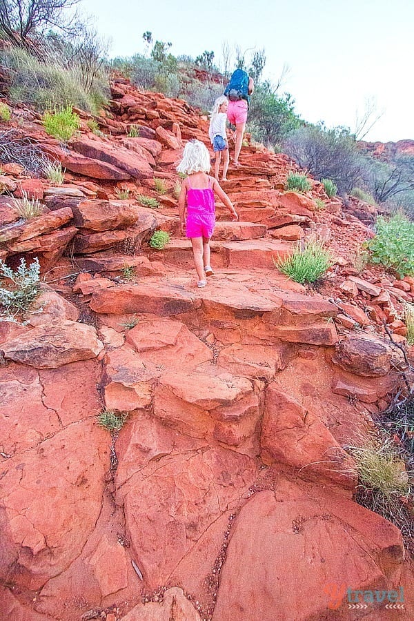 Savannah, Kalyra and Caroline walking up a rock trail in kings canyon