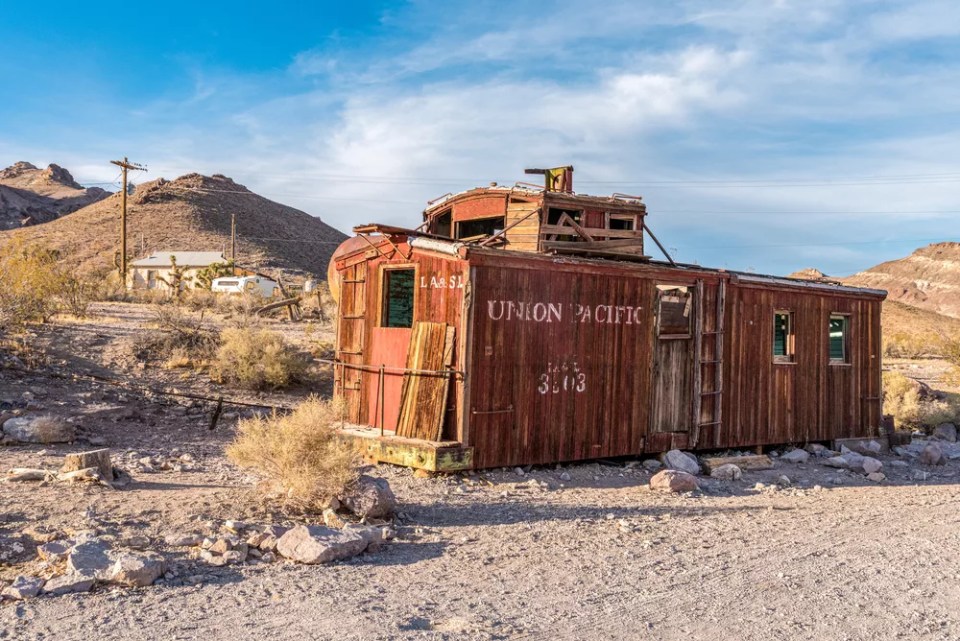 An old train wagon in ghost town Rhyolite in the Death Valley, USA