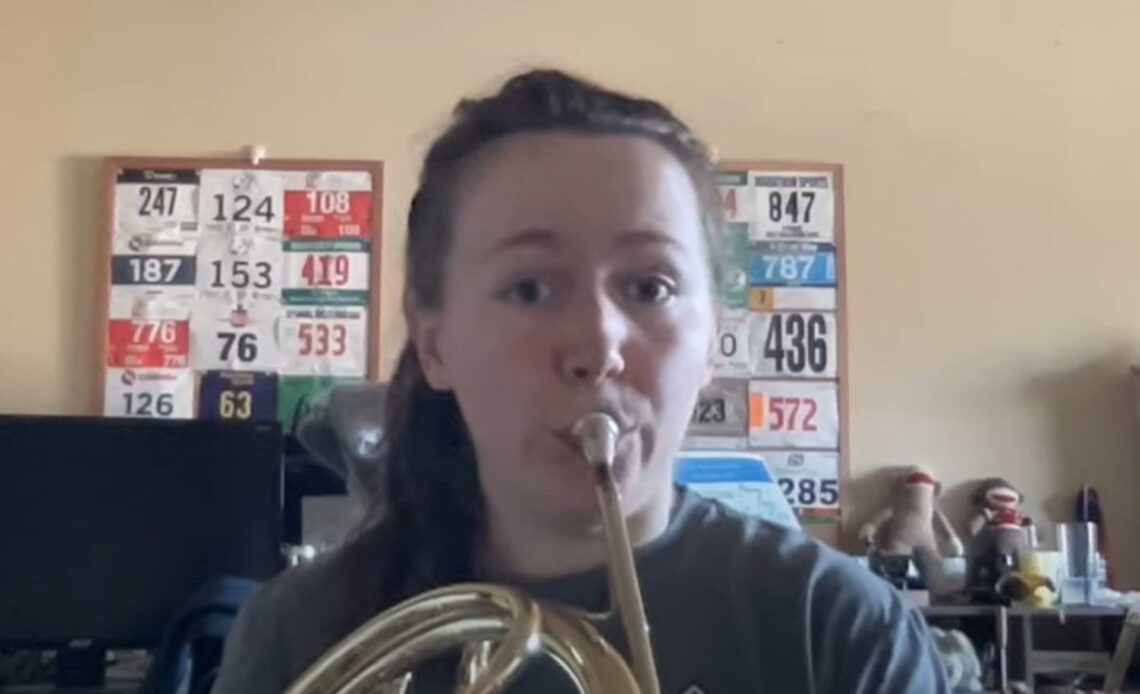 Delta customer on phone to airline for so long she performs French horn jam to hold music