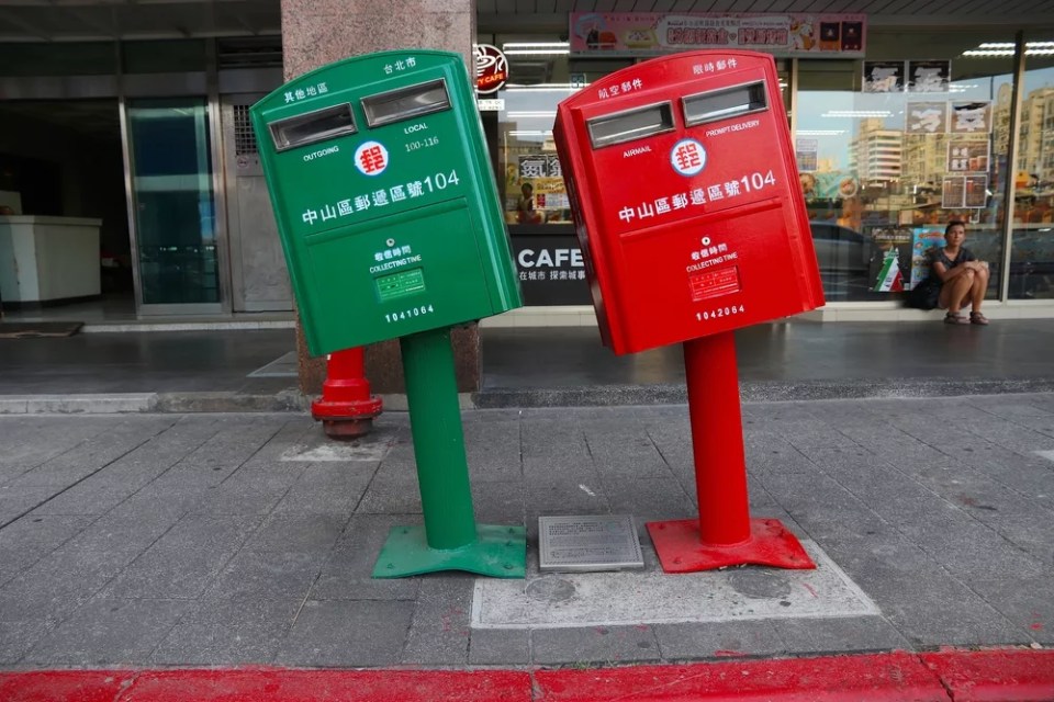 Mailboxes bent during typhoon in Taipei, Taiwan. The twisted mailboxes are a popular local landmark.