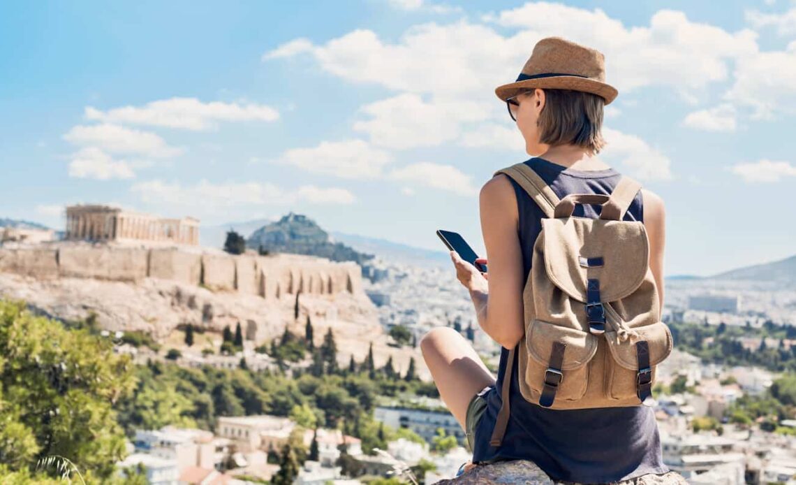 A woman traveling in Europe with a smartphone