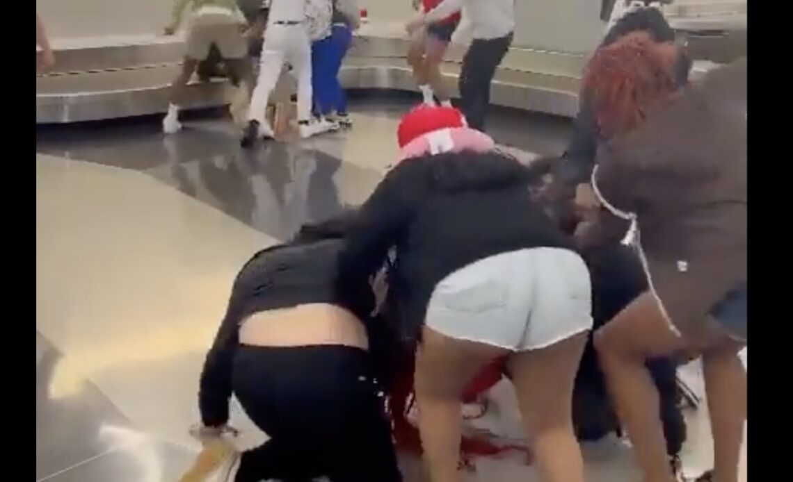 Two arrested over Chicago airport fight as video goes viral