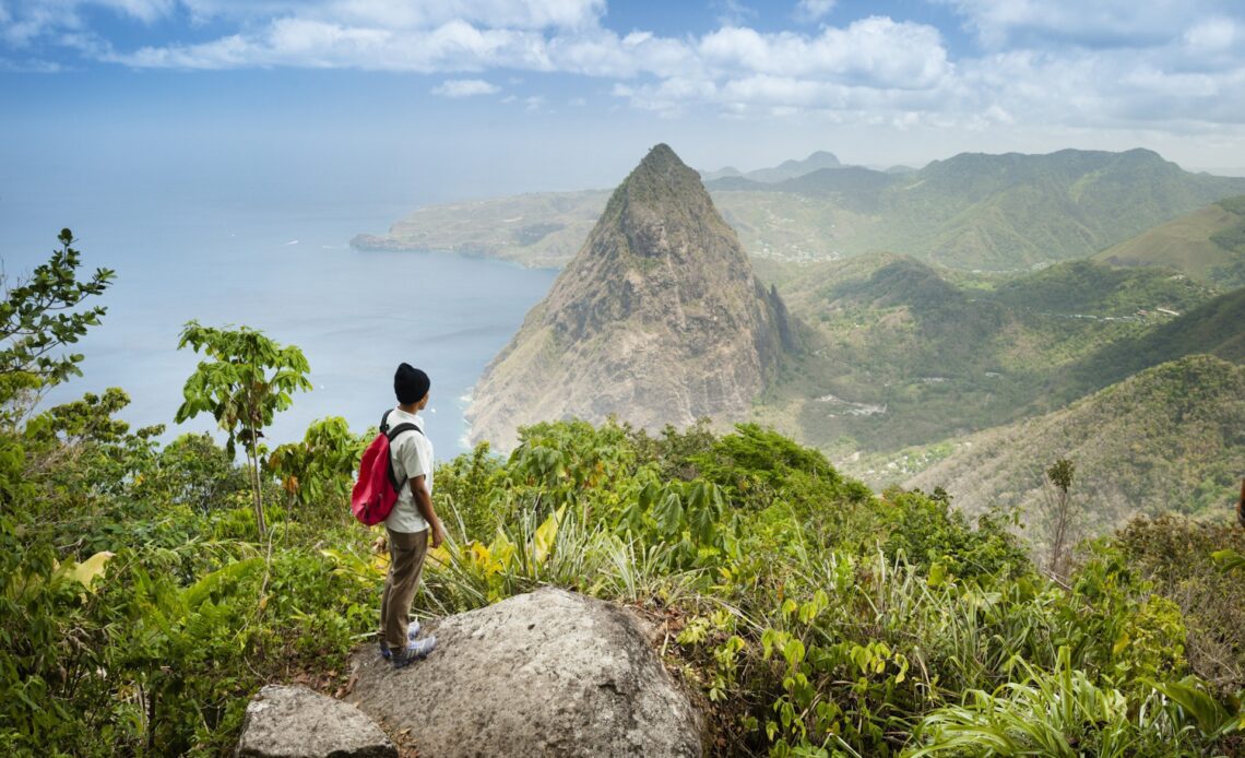 Hiker standing at lookout toward Gros Piton, St Lucia