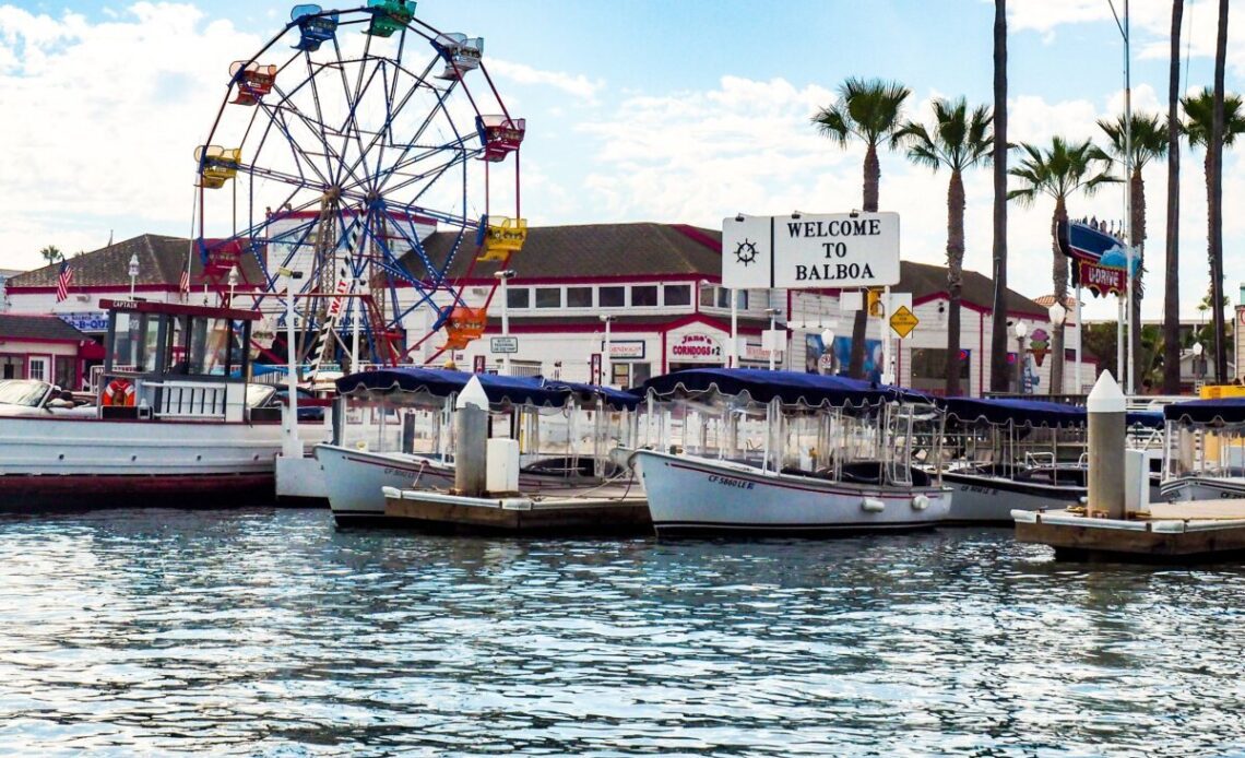 Balboa Island Ferry departing the Fun Zone in Newport Beach, California