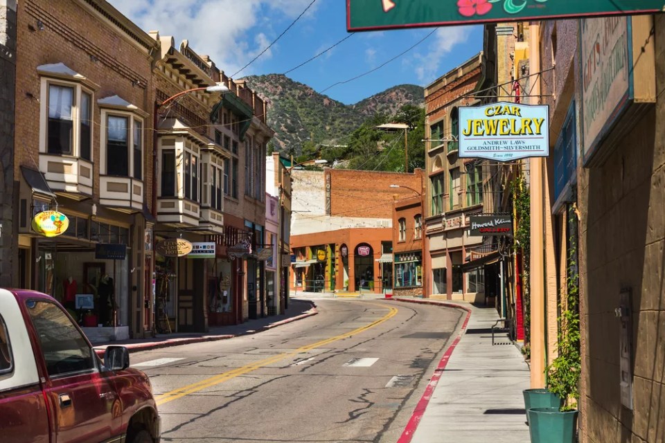 Bisbee, AZ, USA - 3rd August 2013: Car driving on main shopping street.