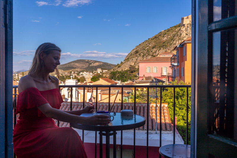 caz sitting on balcony of hotel room