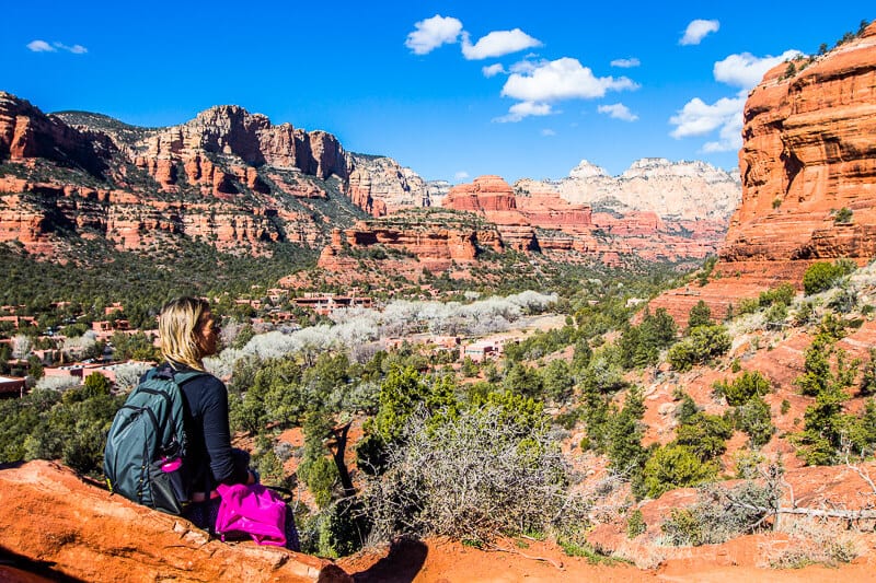 caz sitting on rock looking at the red mountain views of Boynton Canyon Sedona