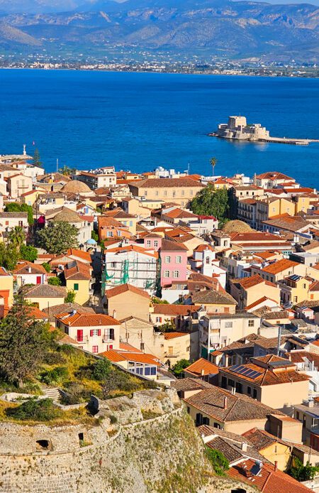 aerial view of old town nafplio by the sea with bourtzi castle in the water