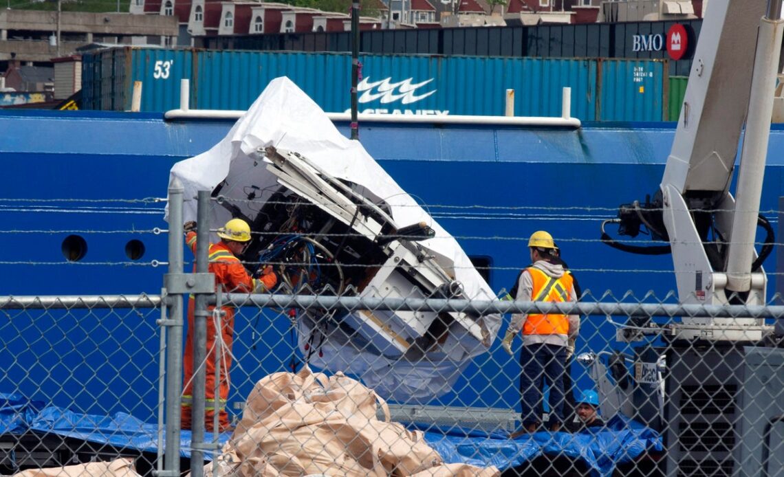 Imploded Titanic submarine seen for first time as pieces recovered up from sea floor