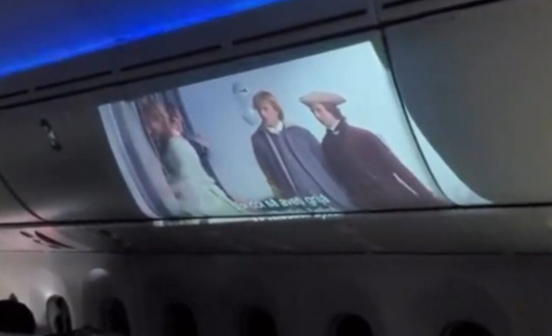 Passenger brings projector on plane and plays film on overhead bin