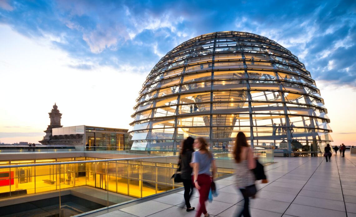 Tourists walking towards the Reichstag Dome, Berlin