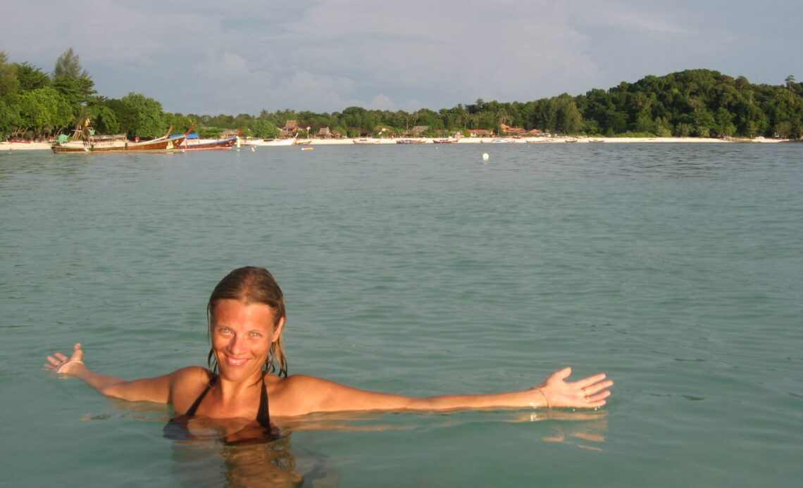 caz with arms outstretched in ko Lipe beach.