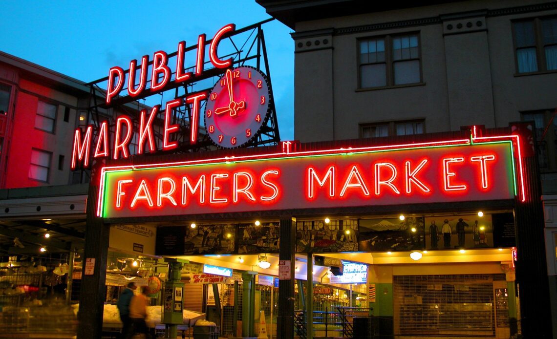 Red neon sign for the Pike Place farmers market