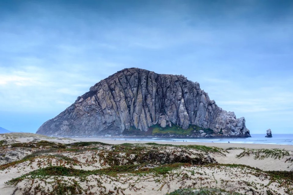 Morro Rock with Sandy Dunes of Morro Creek Beach. Morro Bay