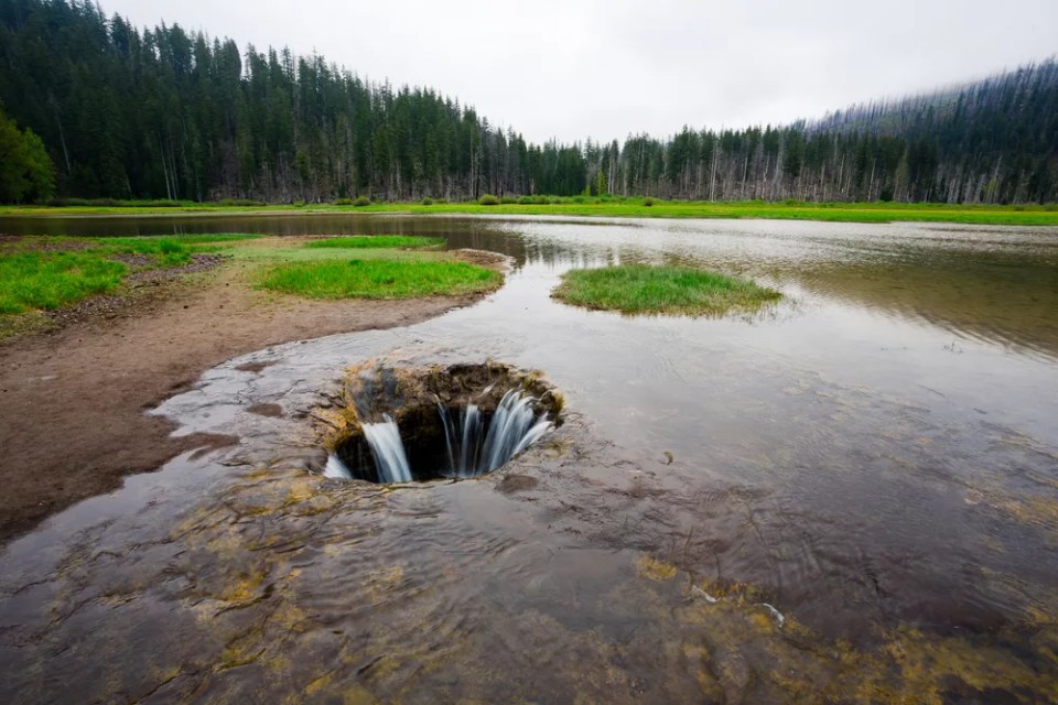 Lost Lake in Central Oregon drains through a large lava tube each year in the late Spring. Geologists and scientists are trying to determine where the water from the lake goes.