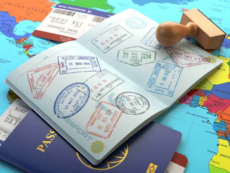 Open passport with stamps