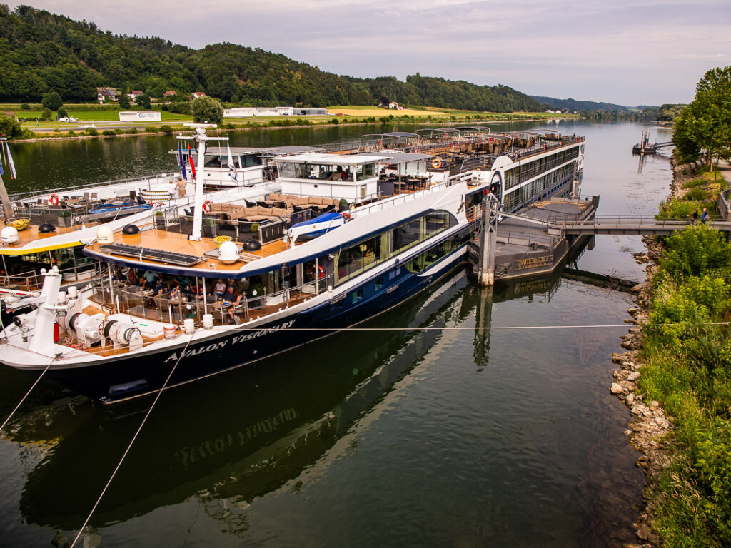 A river cruise docked at port