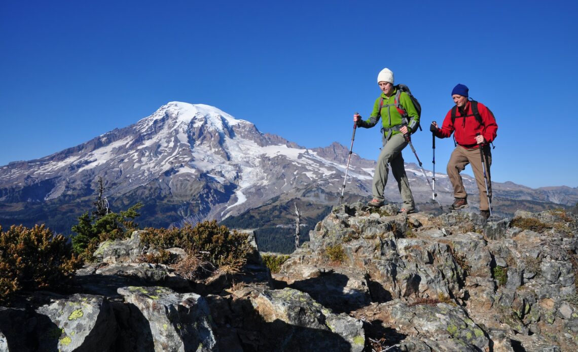 Two people hiking in a mountainous area