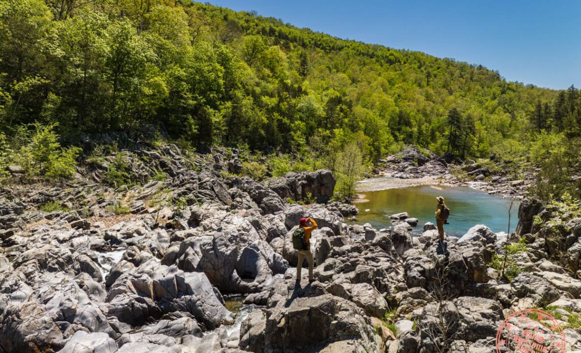 couple standing on rocks at johnson's shut-ins state park in 6 day ozarks of missouri itinerary