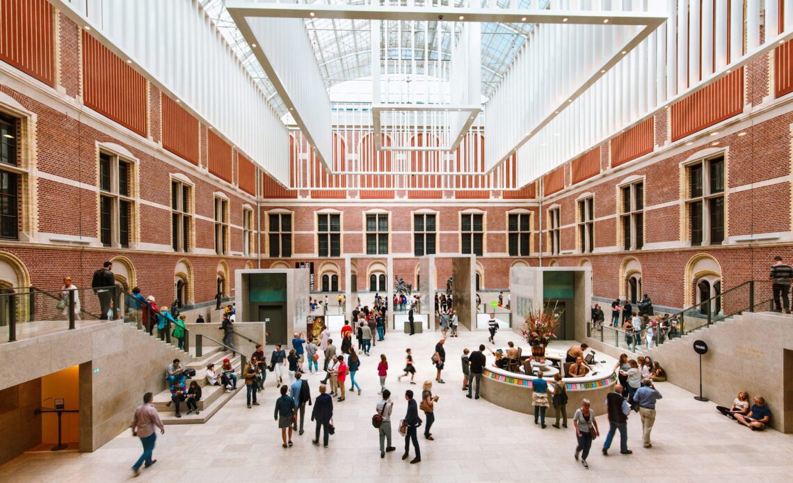 Visitors walking in the atrium of the Rijksmuseum