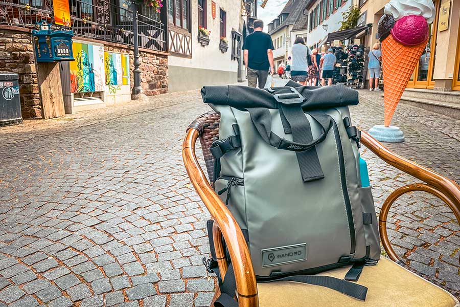 Wandrd Prvke Review - Image of the Wandrd Prvke in Wasatche Green on a chair in Rudesheim Germany