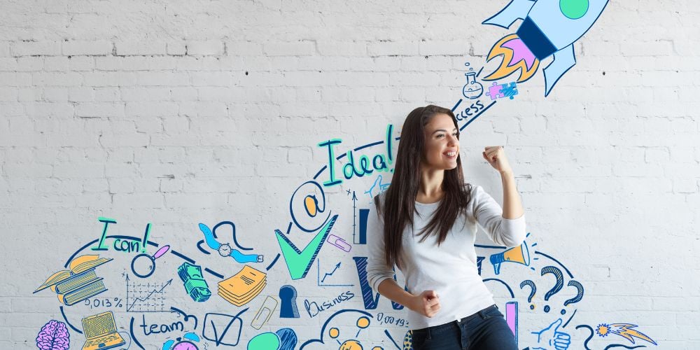 Woman standing in front of a wall full of motivational sayings