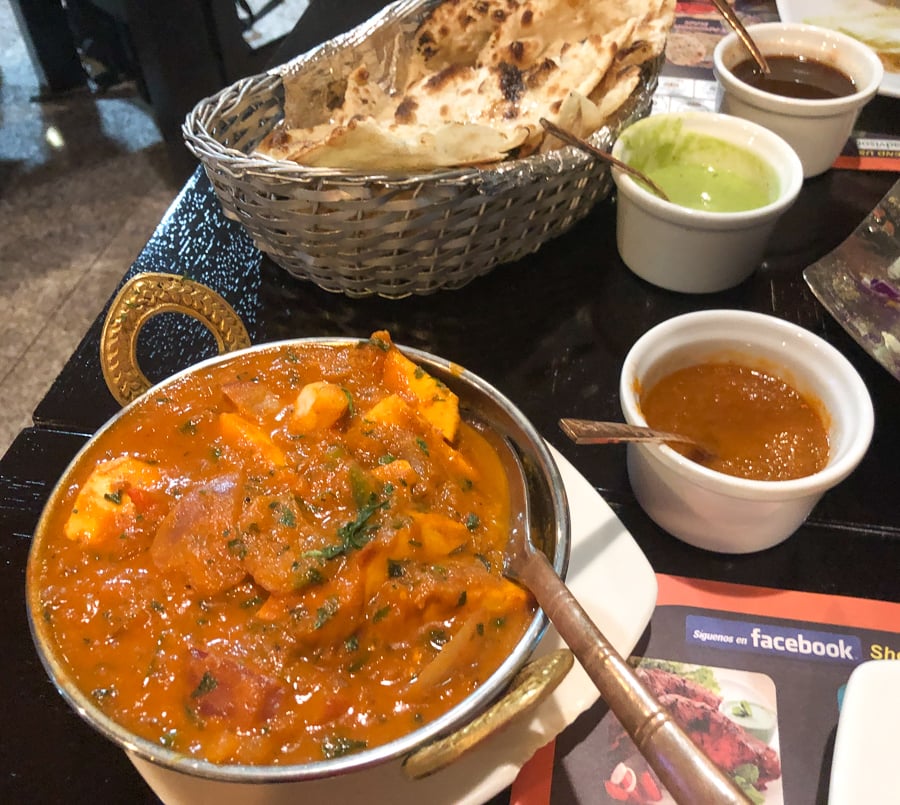 A table full of Indian food