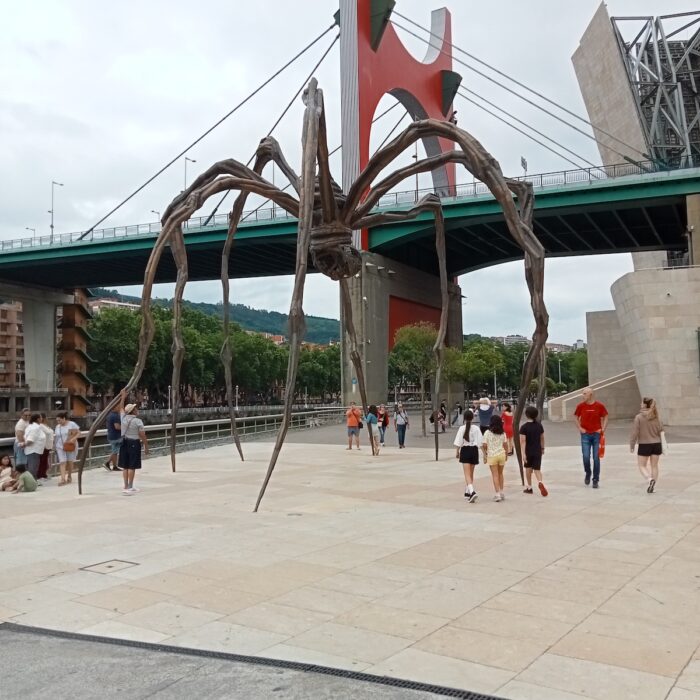 The famous 9-meter high Spider statue, called Maman at the esplanade outside Guggenheim Museum Bilbao