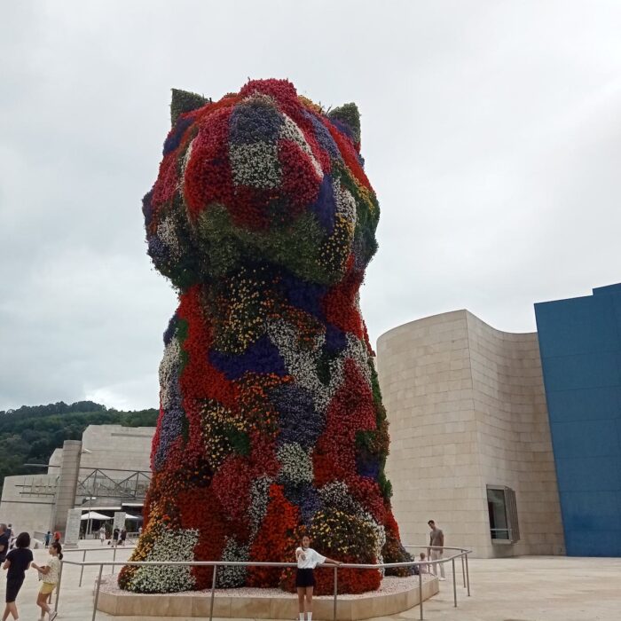 The 43-foot flower-covered puppy guard by artist Jeff Koons at the Guggenheim Museum Bilbao