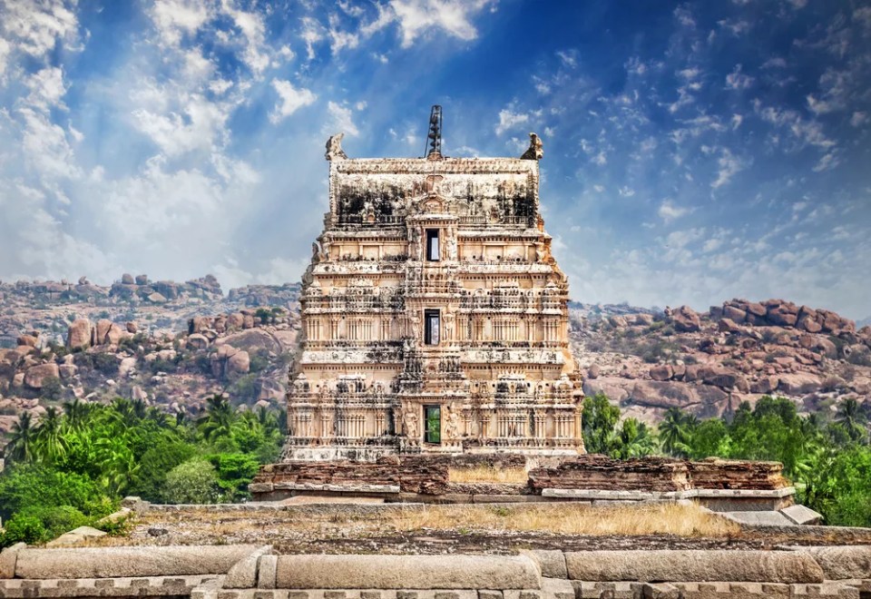 Virupaksha temple tower at blue sky in Hampi, Karnataka, India