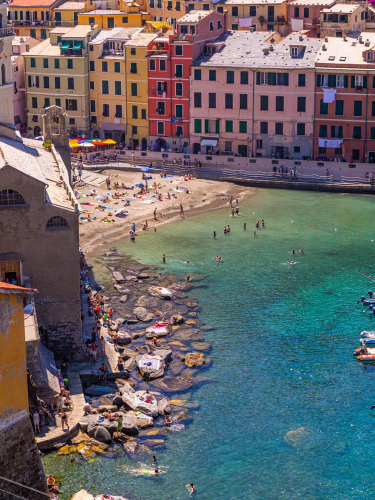 colorful buildings of vernazza on harbor