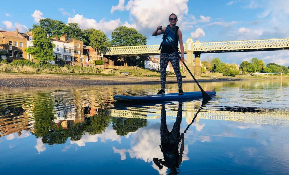 Woman paddleboarding in London (photo courtesy of Active 360)