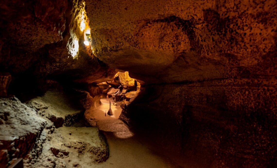 Lighted trail path in underground in Niagara Cave, Minnesota