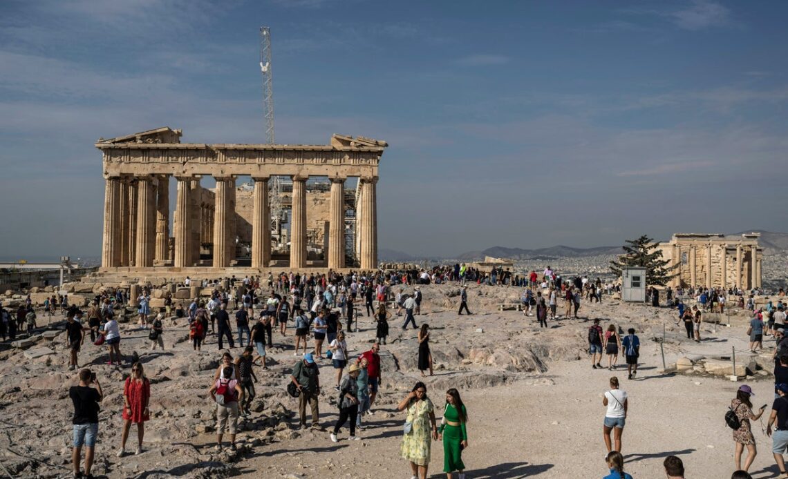 Greece plans hourly caps on visitors to ancient Acropolis and will let in up to 20,000 daily