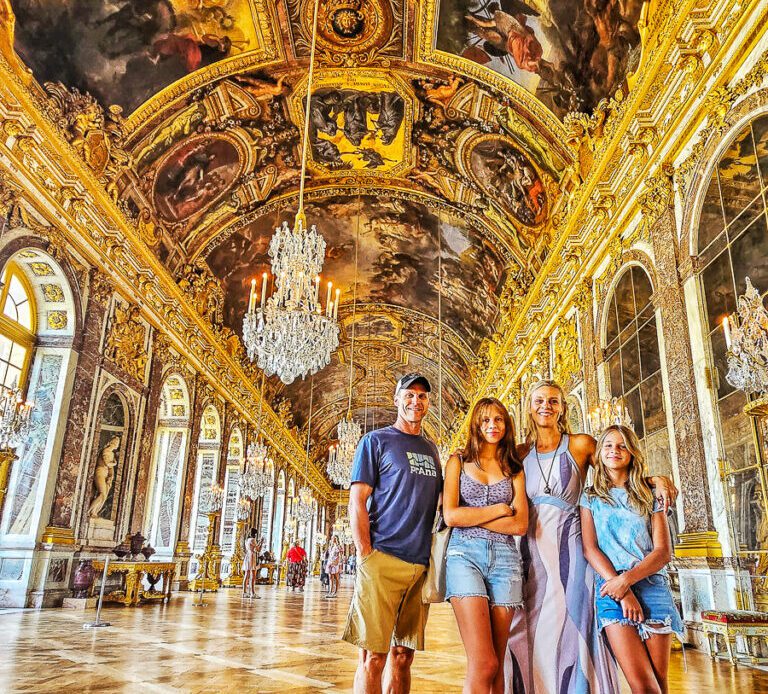 Family of four inside a palace in France