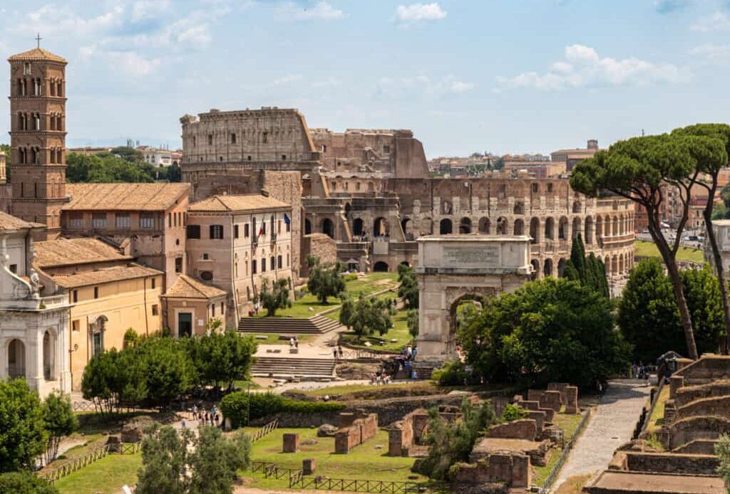 aeiral view of roman forum and colosseum in the background