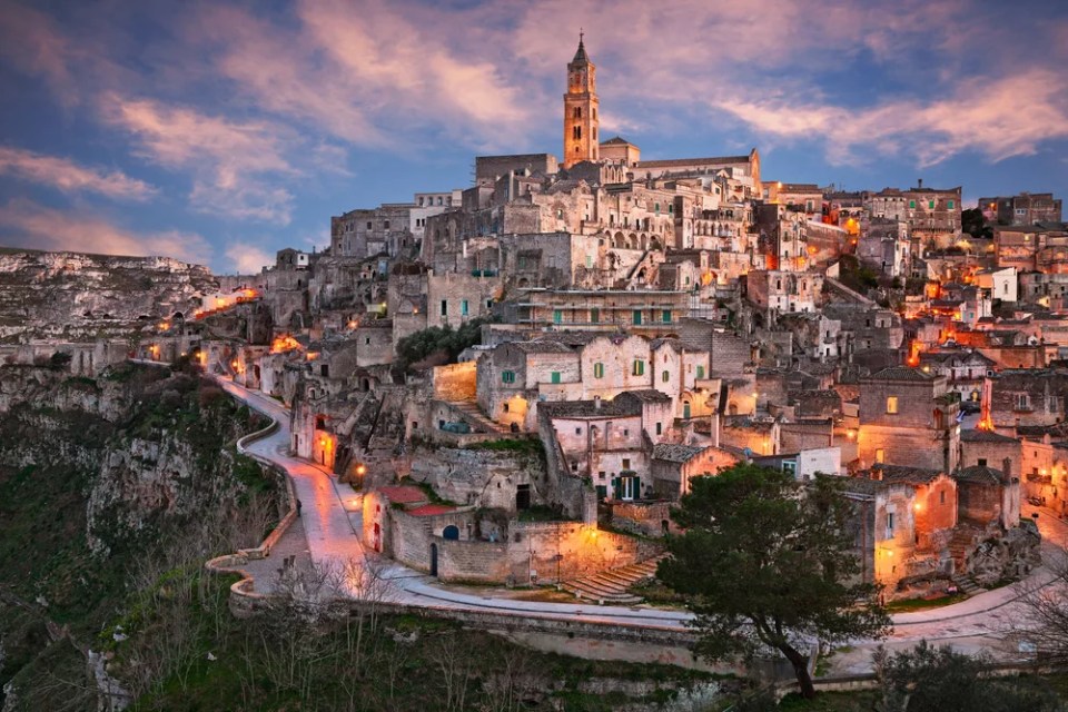 Matera, Basilicata, Italy: landscape at sunset of the picturesque old town called Sassi of the city European Capital of Culture 2019