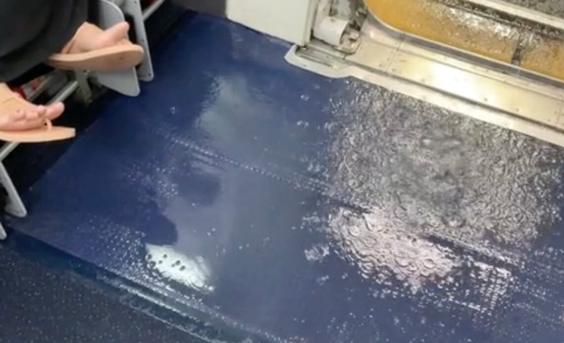 Passenger claims bag and seat left soaking wet after rain pours into plane