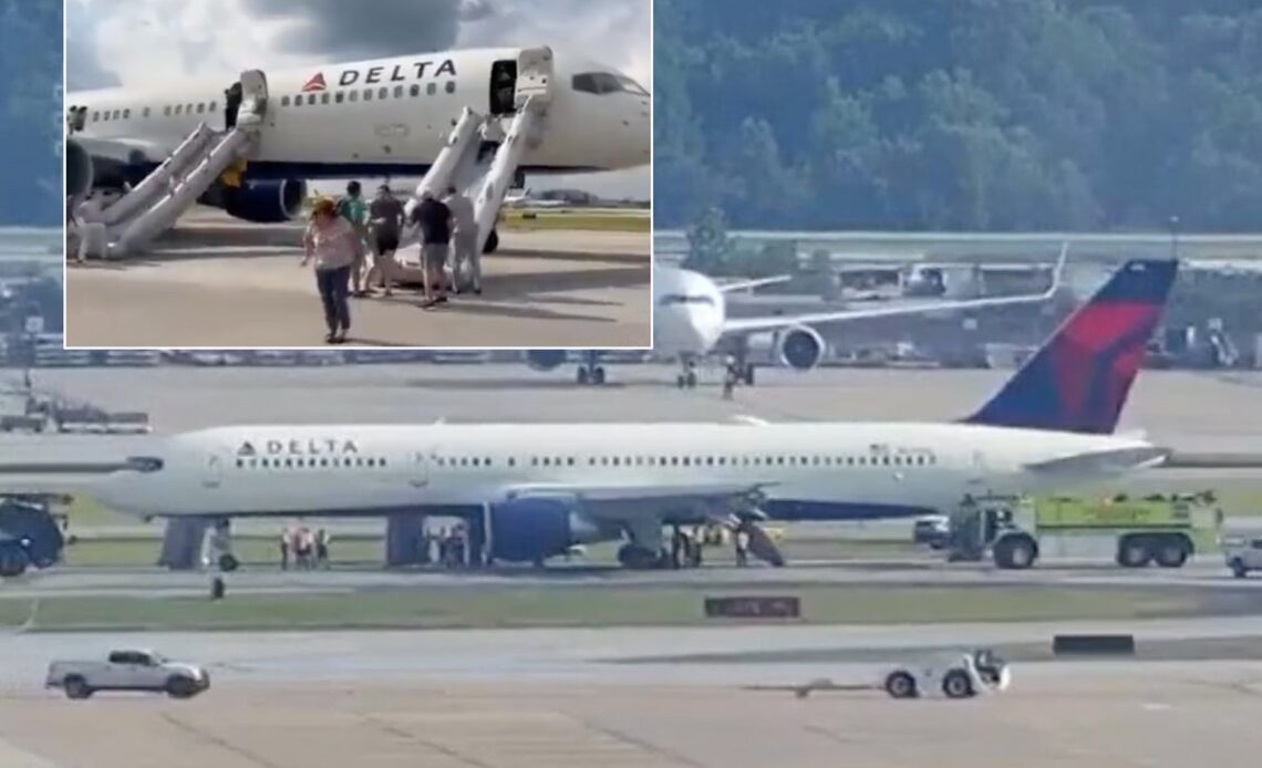 Plane-load of passengers evacuated from Delta flight after tyres burst into flames