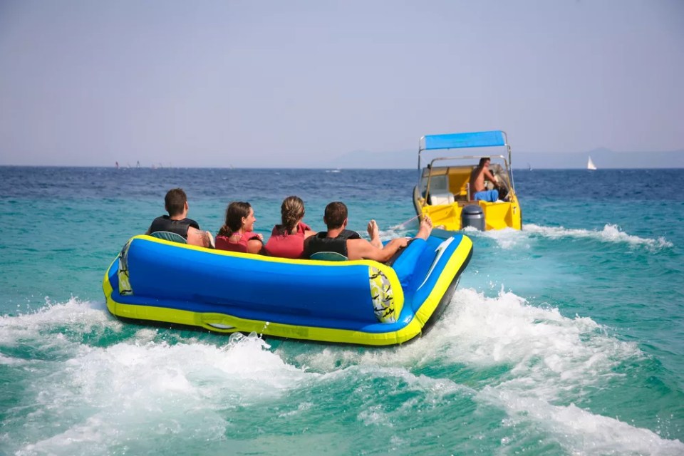 Group of four getting ready for bouncing fun on Croatian coast