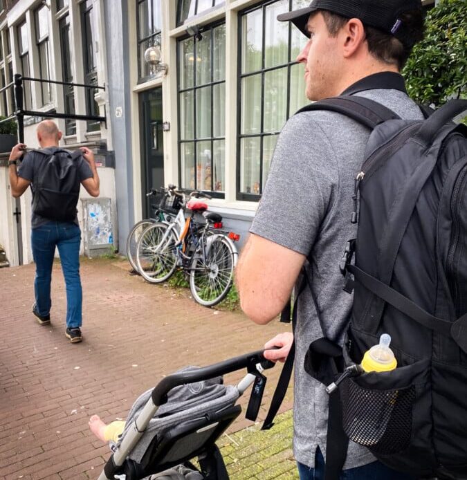 Pushing a Stroller on Prinsengracht, Amsterdam