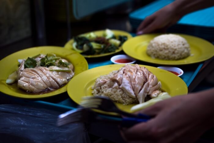 One of the most popular Singapore street food - Chicken Rice photo by Nauris Pukis via Unsplash