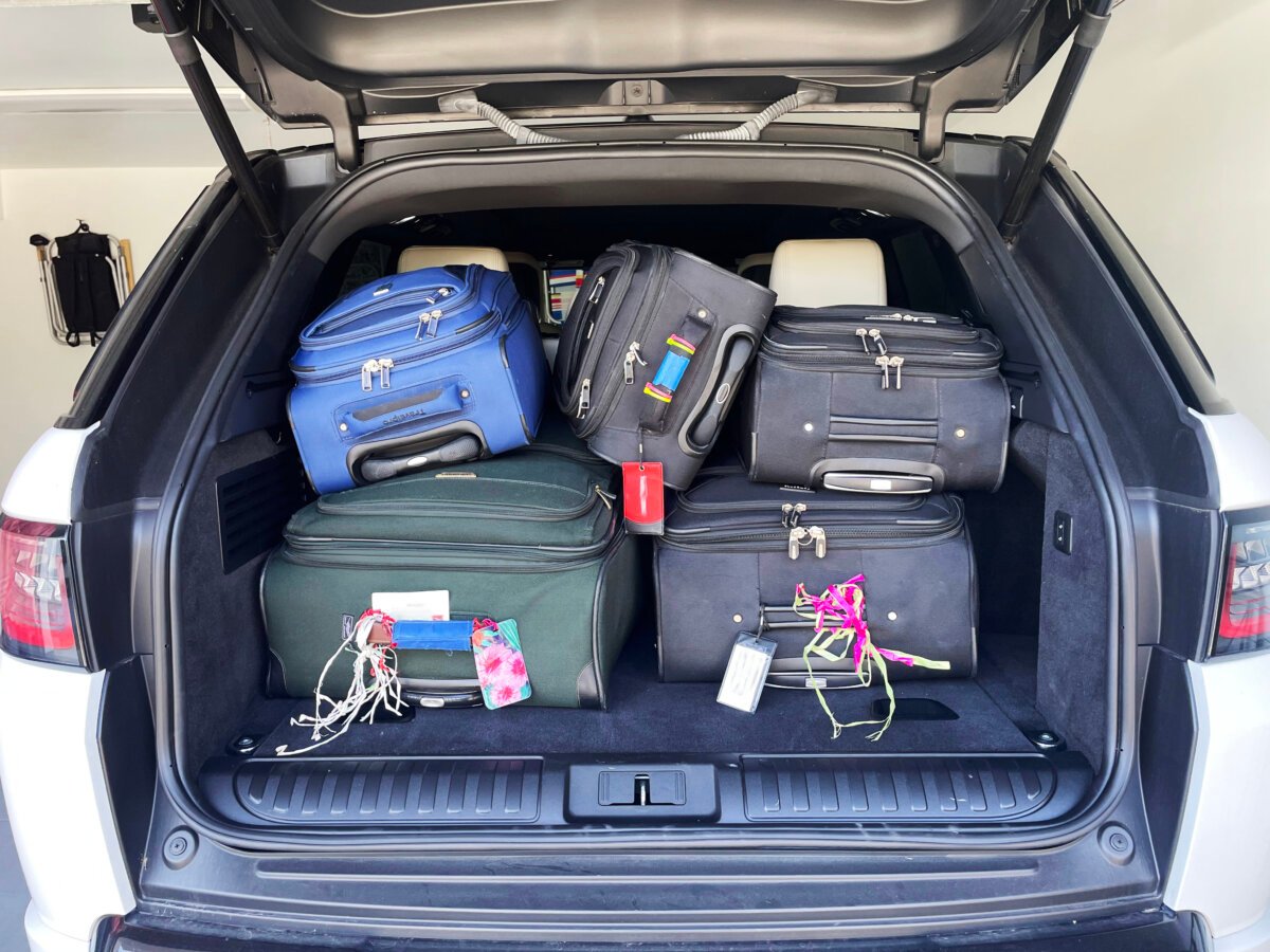 luggage packed inside the trunk of a vehicle