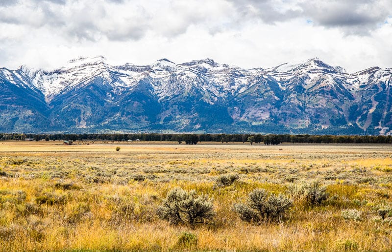 jagged Teton Mountain range on a gloomy day