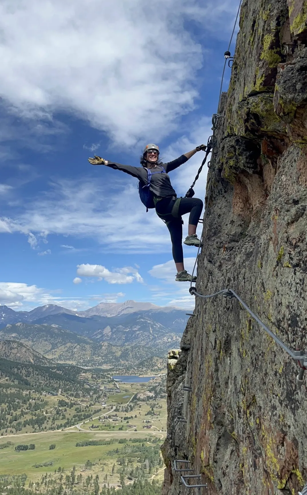 Laura Kiniry climbing a via ferrata in Estes Park, Colorado