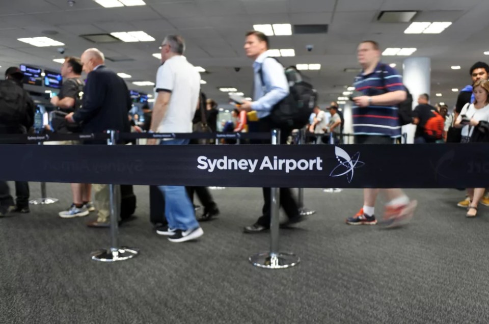 Passengers at Sydney Airport Sydney, Australia. It is the busiest airport in Australia, handling 35,630,549 passengers in 2011 and 326,686 aircraft movements in 2013.