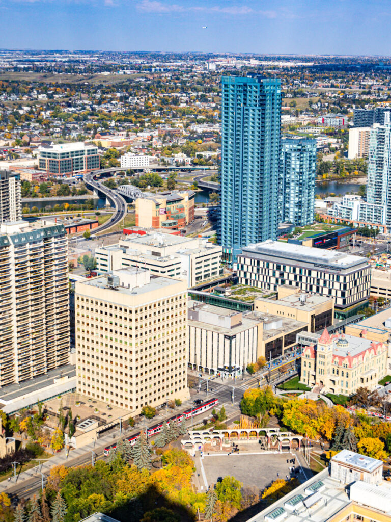 aerial view of calgary high rises and plains in the background